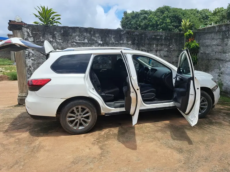 Our own white Nissan Pathfinder 7-seater SUV for hire at Yogi Guest House, Lungi