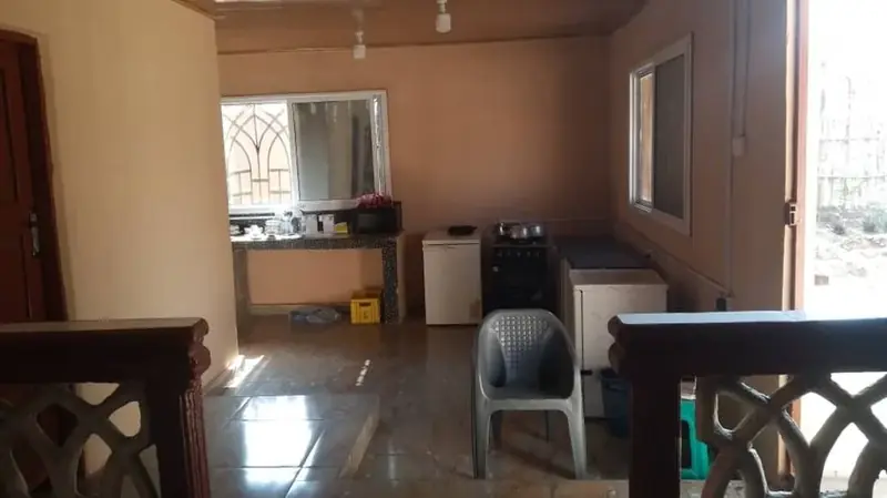 Restaurant and kitchen — Yogi Guest House