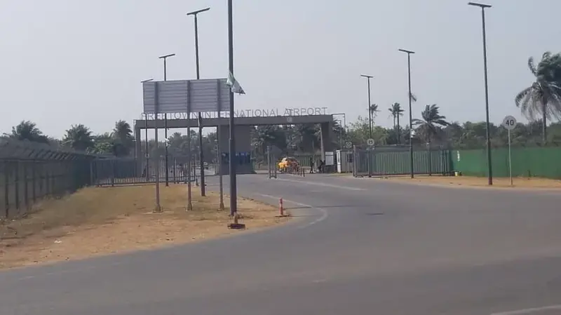 Freetown International Airport gate — directly opposite Yogi Guest House
